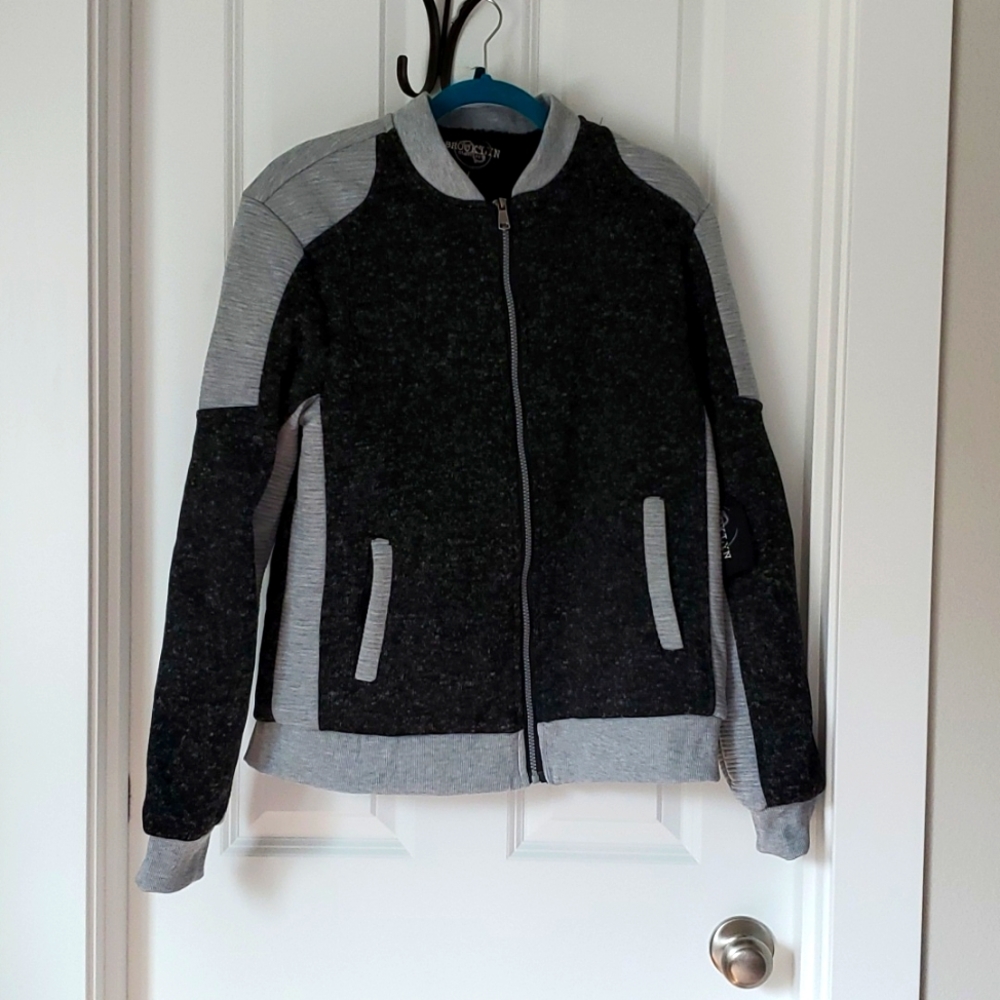 Black and grey zip-up